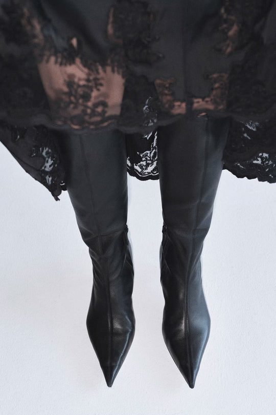 Skinnhælte stikk ankelstøvler